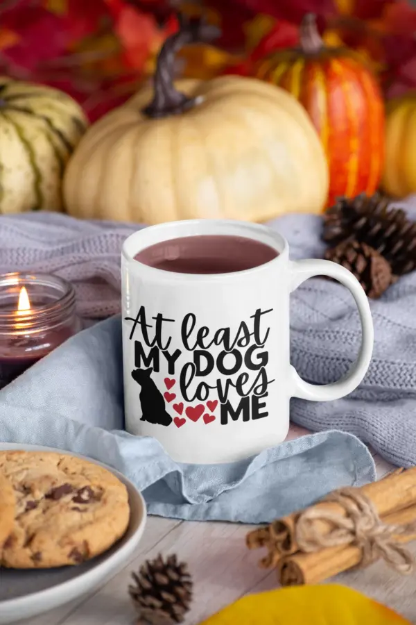 at least my dog loves me mug