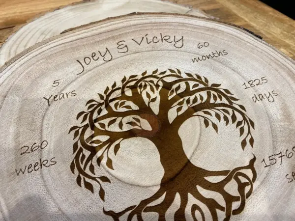 The 5th Wedding Anniversary Gift - Log Wood Slice - Personalised features Joey & Vicky’s names, carved tree design, symbolic time details, and is a thoughtful present for celebrating five years together.